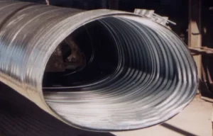Corrugated steel pipe arch for culvert and low-clearance drainage applications