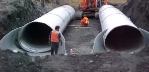 Corrugated steel pipe conveying stormwater through a culvert