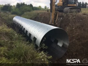 Guthrie IA corrugated metal pipe bridge replacement zebra pipe polymer coated steel