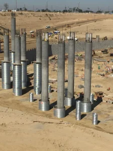 Large-diameter corrugated steel pipe caisson fabricated for the SoFi Stadium foundation system.