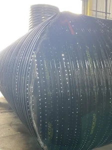 96-inch perforated polymer-coated corrugated steel pipe used for underground retention systems at the Ontario Ranch Commerce Center project.