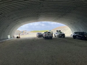 Vehicles traveling through the structural plate arch underpass at the Exit 41 Interchange.