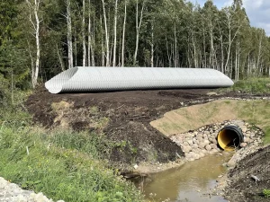 Tootsi 3 Completed steel bridge supporting a wind farm access road crossing.