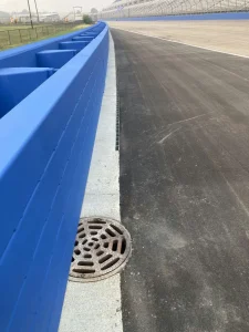 Completed race track drainage system along the Milwaukee Mile racing surface.