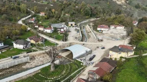 Aerial view of the large corrugated steel bridge and surrounding river improvements in Düzce.