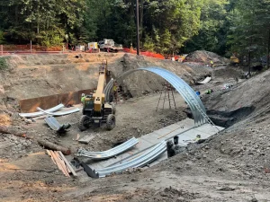 Padden_Creek_resized Construction crew assembling a deep corrugated steel structural plate arch over Padden Creek in Bellingham, Washington.